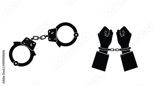 Black handcuffs and hands in a stark dramatic silhouette