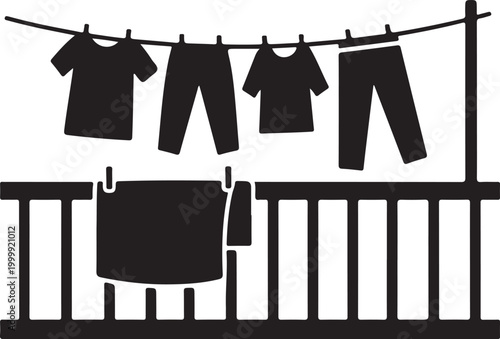 Black and white of clothes hanging on a line and a balcony railing, laundry drying on a clothesline, household chores symbol