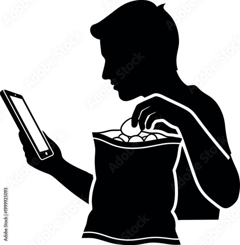 Silhouette of a person engrossed in a smartphone and holding takeout food