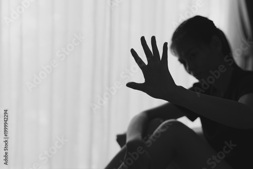 The concept of stopping violence against women. Stressed unhappy crying woman victim in fear suffering from female domestic violence having life difficulties and social problems