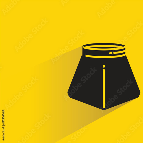 inkpot icon with shadow on yellow background