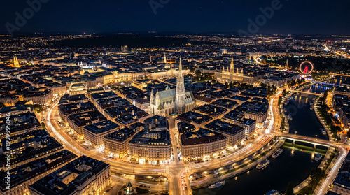 Fotografie Aerial view of city scape at night in Vienna, Austria.
