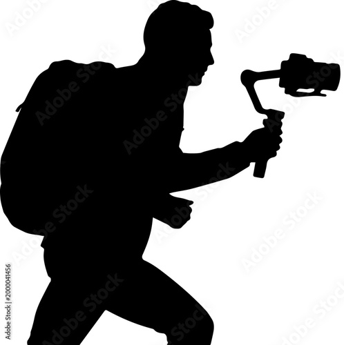 Silhouette of a Man with Backpack Holding a Camera on a Gimbal Stabilizer