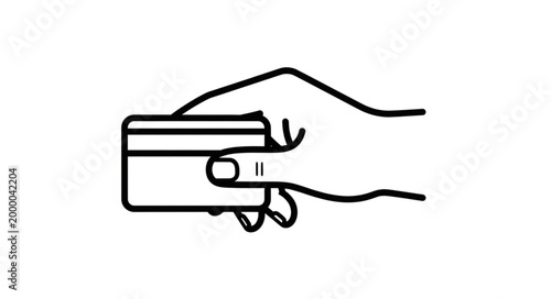 Hand holding a credit card for payment.