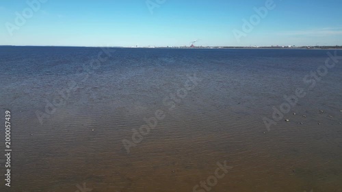 Sunny sea shore in springtime Kempeleenlahti bay, Kempele Finland