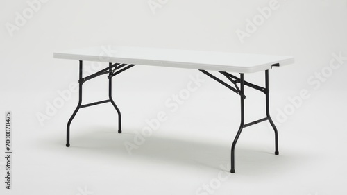 White rectangular plastic folding table isolated on white background