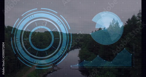 Hovering blue HUD reticle left-center overlaying river valley, showing stream, charts and grid
