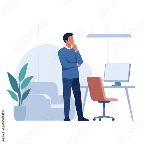 A man stands thoughtfully in a modern office with a computer and plant