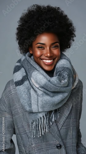 African female young adult gray scarf coat closeup portrait textured wrap cozy winter elegance