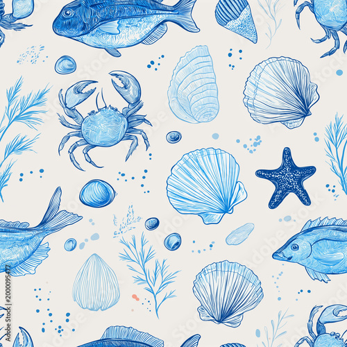 Blue hand drawn ocean life seamless pattern with fish, crabs, shells and starfish on white background, nautical marine sketch design for fabric and wallpaper