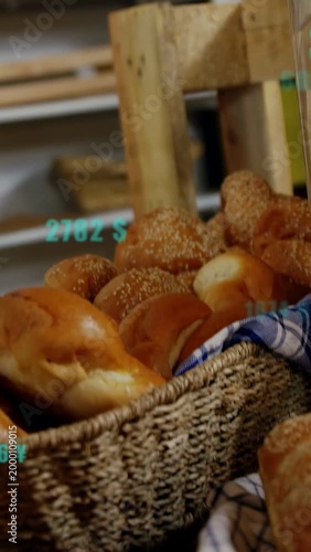 Vertical video: Floating price labels driving camera pan down revealing bread basket showing prices