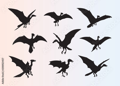 Collection of nine stylized dragon silhouettes in various flying and standing poses