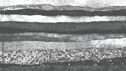 Gray and white layered textured abstract background with rough uneven surfaces and spots