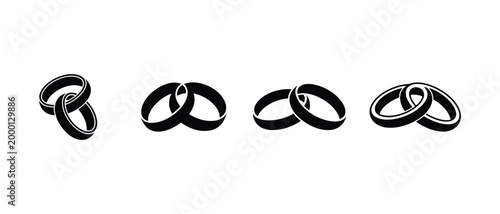 Tableau sur toile Interlocking wedding rings collection in elegant black silhouette