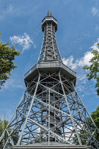 Fotografie Low Angle View Of Petrin Observation Tower Metal Structure Against Blue Sky With