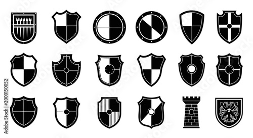 Set of 20 black and white heraldic shield icons crests and coats of arms with various geometric patterns and designs on white background