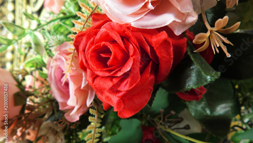 Closeup of artificial flowers decorated on the stage of a ceremonial function
