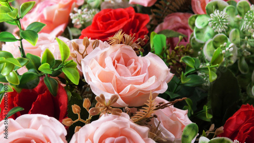 Closeup of artificial flowers decorated on the stage of a ceremonial function