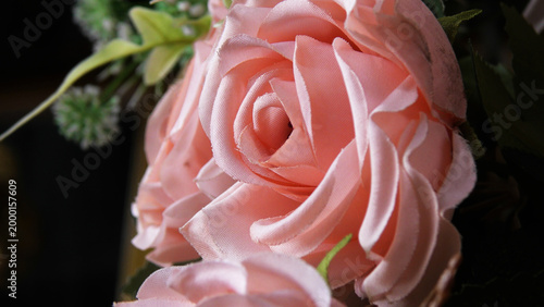 Closeup of artificial flowers decorated on the stage of a ceremonial function