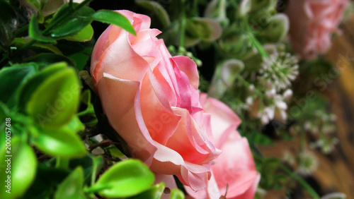 Closeup of artificial flowers decorated on the stage of a ceremonial function