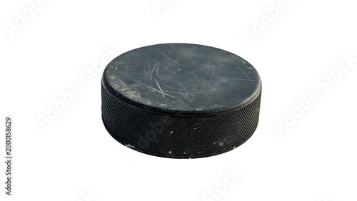 Bild auf Leinwand Hockey puck resting on a flat surface after practice session in ice rink at indo