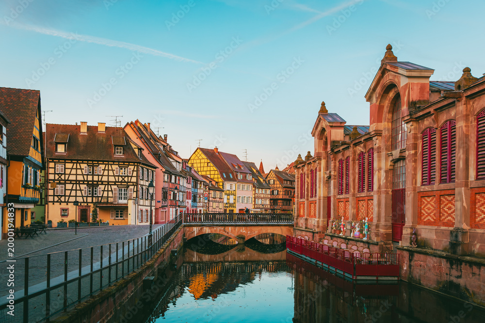 Obraz premium Colmar historic center at sunrise with intense colors and no visitors in Alsace France