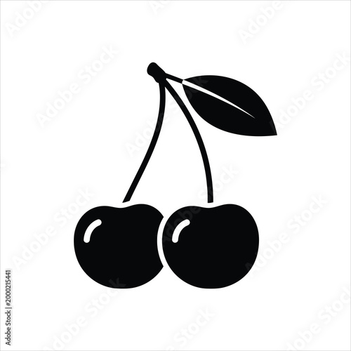 Two ripe cherries with a stem and leaf during summer isolated on white background