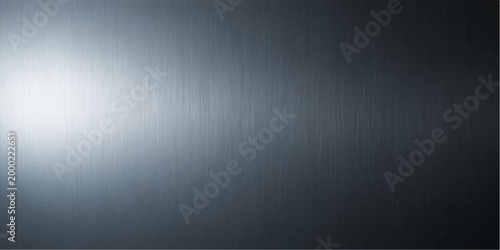 A dark grey brushed metal texture background featuring a seamless stainless steel pattern on a metallic silver surface for a modern industrial wallpaper design