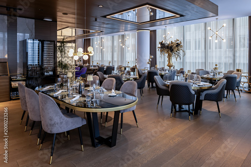 Принти на полотні Stylish modern hotel restaurant interior with refined new design elements