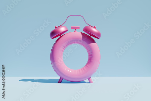 Fényképezés Pink alarm clock combined with inflatable ring concept