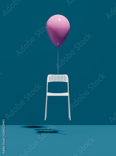 Photos Pink balloon lifting white chair against blue background