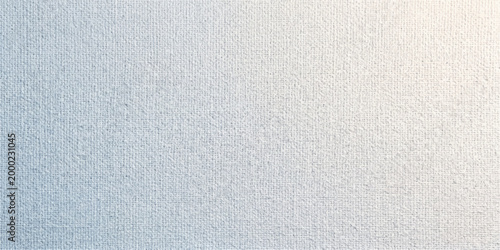 A seamless vintage design featuring a rough white and blue paper texture blended with a closeup of blank linen fabric material for a grunge textile surface backdrop