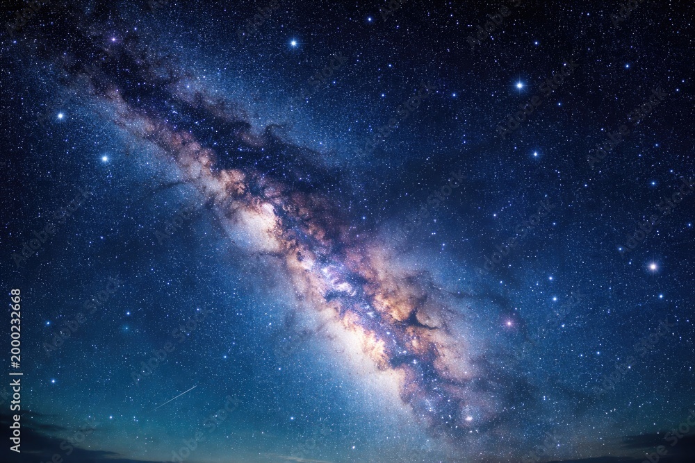 Fototapeta premium Immense starry expanse glowing brightly against a tranquil blue sky