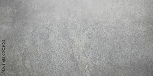 A closeup of a blank grey concrete wall texture featuring a rough, dirty cement surface with a vintage grunge pattern and old stone material for a textured backdrop design
