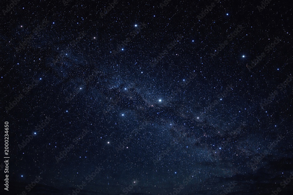 Fototapeta premium Dark night sky filled with sparkling stars for backdrop
