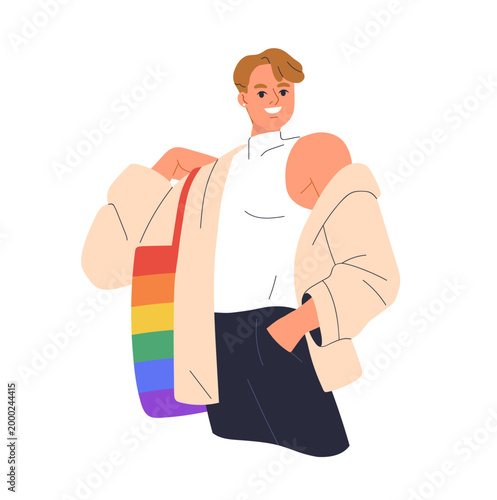 Young gay man in modern style outfit, clothes and rainbow colored striped tot...