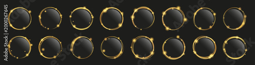 Golden ring frame collection set. Glowing circular shapes with light particles on dark background