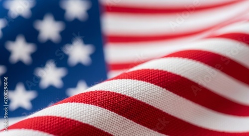 American flag waving with stars and stripes close up view of fabric texture and colors