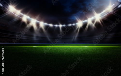 Soccer stadium with lights and a green grass field