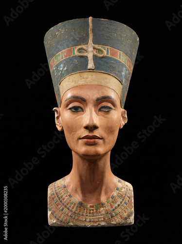 Ancient Egyptian Queen Nefertiti bust isolated on black background iconic masterpiece of Amarna period art