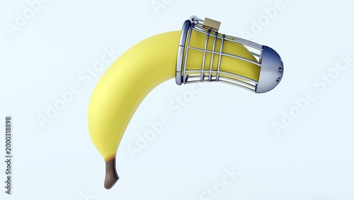 Foto 3d render of a yellow banana placed and a metal cage-style male chastity device