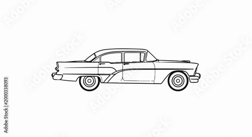 Classic four-door sedan with a streamlined silhouette and whitewall tires