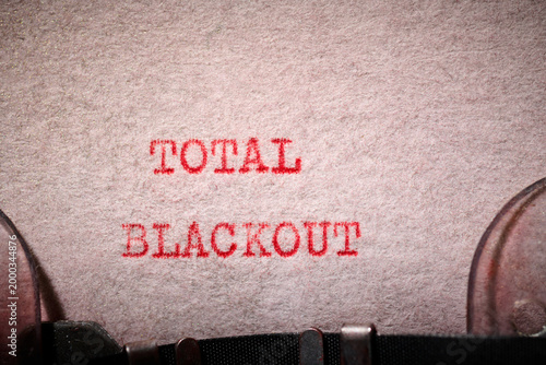 Quadro em tela total blackout message concept written with a typewriter