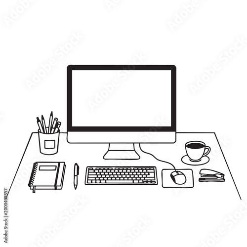 Organized workspace with computer and office supplies on a desk