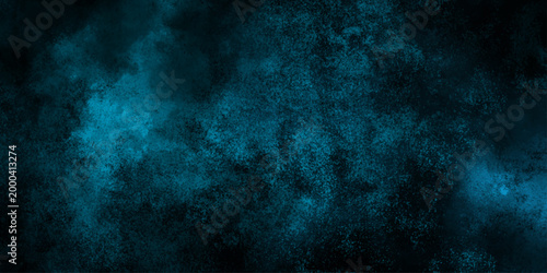 Abstract cloud and vapor texture background. Blue powder dust smoke on black background. Abstract smoke wallpaper background for desktop. Blue mist or smog moves on black background. 