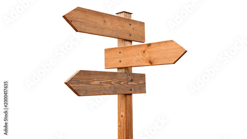 Bild auf Leinwand Wooden signpost with three directional arrows pointing in different directions o