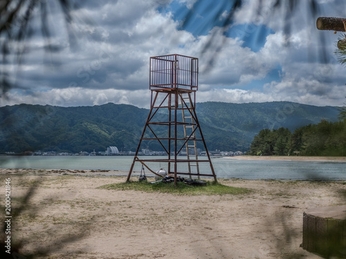 A close view of a lifeguard chair on a beach in Japan