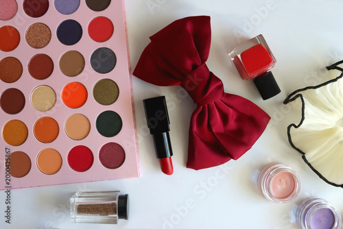 Various accessories and beauty products on white background. Coquette aesthetic. Flat lay.