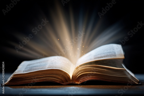 The Bible was open with a burning light illuminating it.