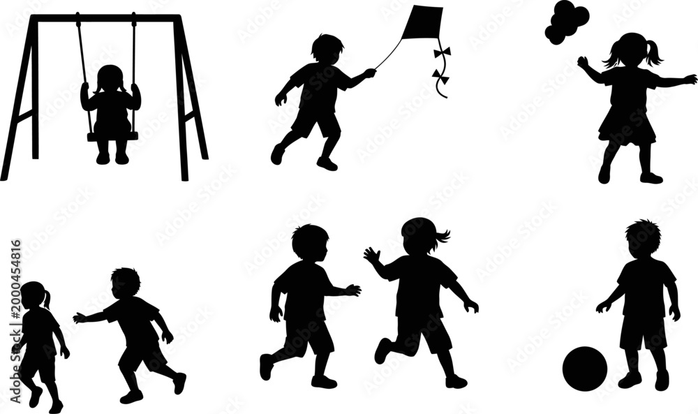 Fototapeta premium Silhouettes of children playing a joyful outdoor scene